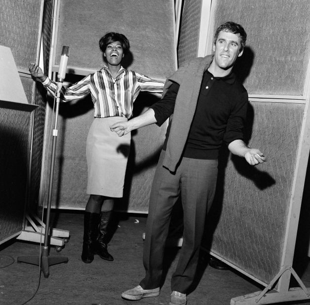 Bacharach and Dionne Warwick record a song in London in 1964. Many of Bacharach's songs — "Say a Little Prayer," "Walk on By," "Do You Know the Way to San Jose" — became hits for Warwick, one of the biggest-selling female vocalists of the 1960s.