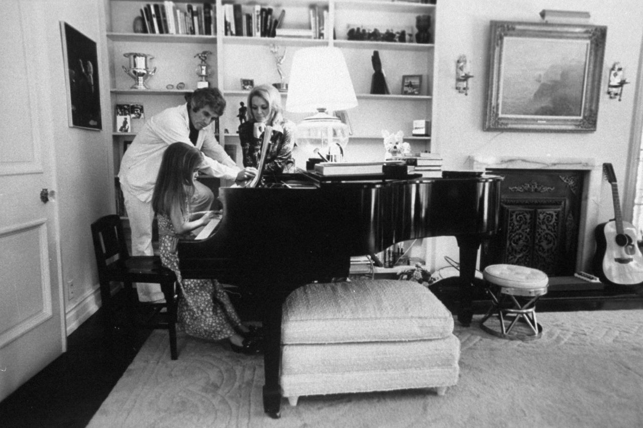 Bacharach and Dickinson watch their daughter Nikki play the piano in 1974. Bacharach and Dickinson divorced in 1980.