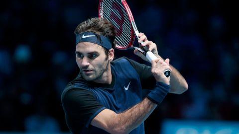 Federer, who was signed by Nike aged 13, plays a backhand at the 2015 World Tour Finals. 