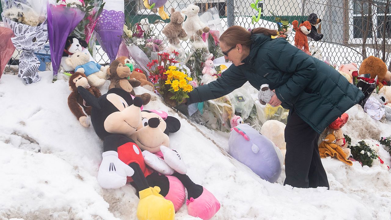 Mourners placed flowers and stuffed animals at the site of the crash. 
