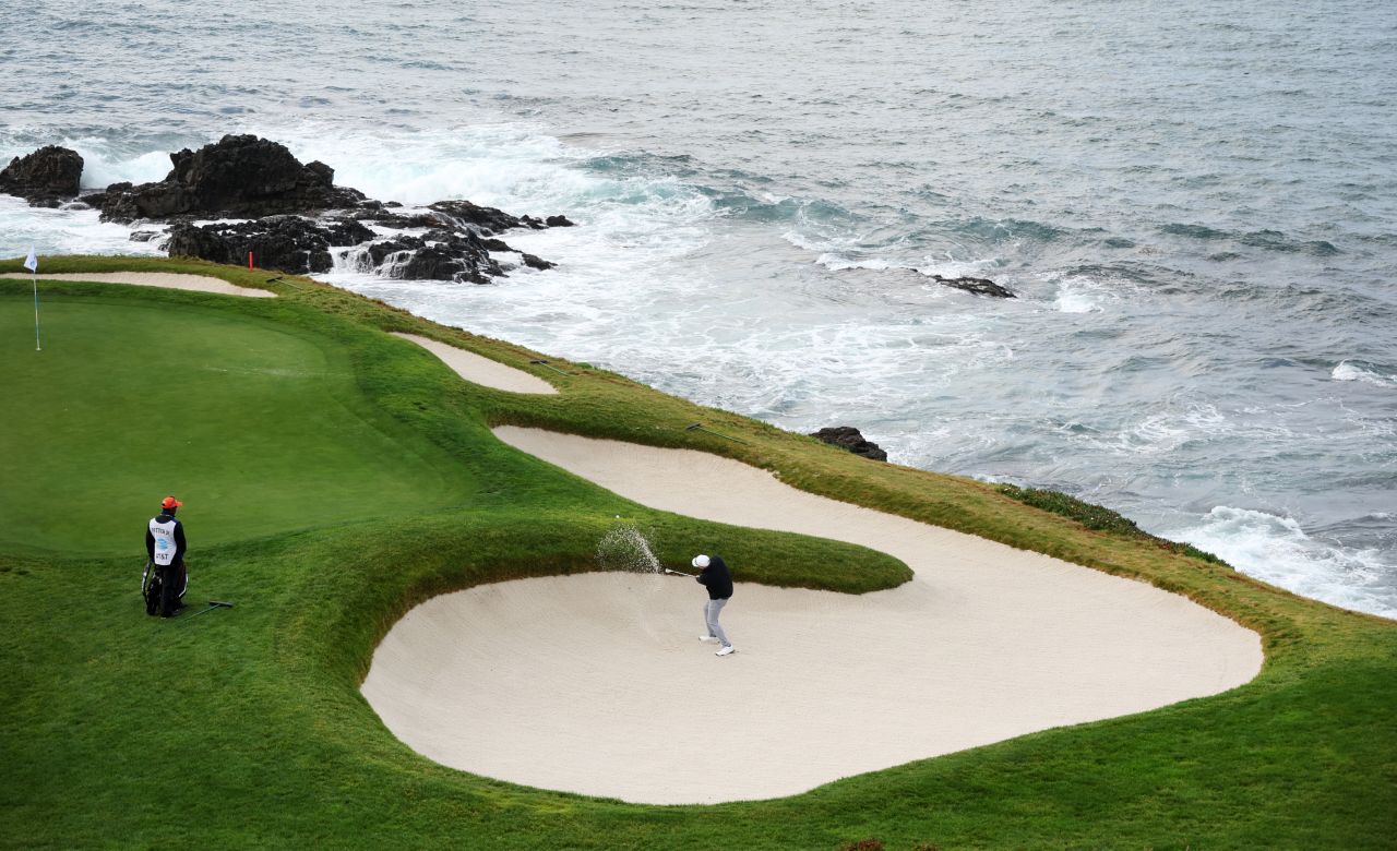 Ted Potter Jr. plays a shot out of the bunker during the third round of the AT&T Pebble Beach Pro-Am on Sunday, February 5. The tournament was held at Pebble Beach Golf Links in Pebble Beach, California.