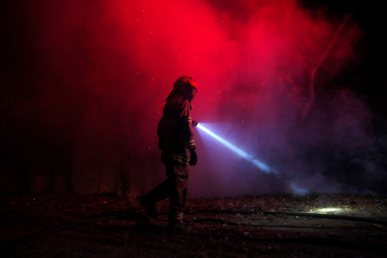 A firefighter works in Santa Juana, Chile, on Wednesday, February 8. At least 22 people have died in connection with <a href="https://www.cnn.com/2023/02/04/world/chile-wildfires-death-toll/index.html" target="_blank">widespread forest fires</a> in south-central Chile, according to government officials.