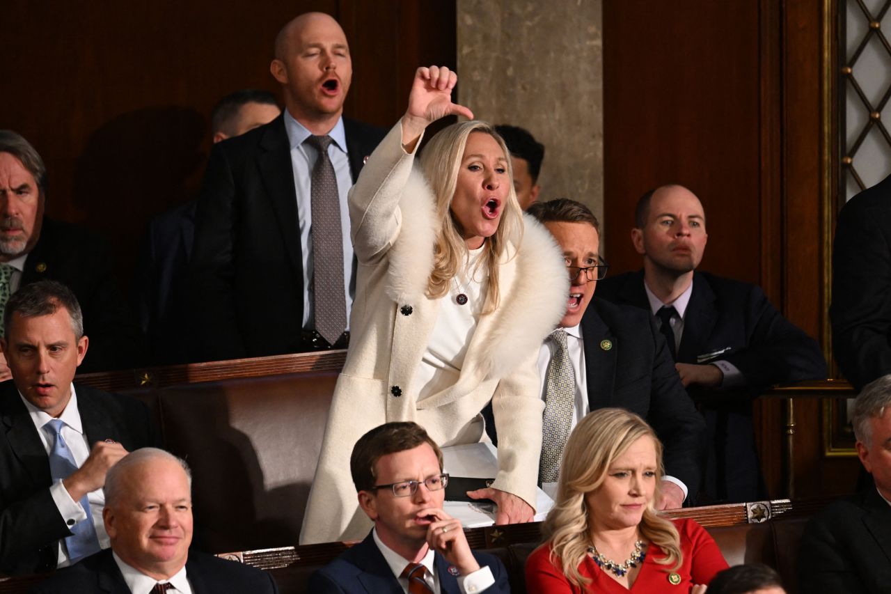 US Rep. Marjorie Taylor Greene gives a thumbs-down and yells at President Joe Biden during his State of the Union address on Tuesday, February 7. Republicans in the House chamber <a href="https://www.cnn.com/2023/02/08/politics/republicans-interrupt-biden-state-of-the-union/index.html" target="_blank">repeatedly heckled Biden during his speech</a>, ignoring the occasional shushes from House Speaker Kevin McCarthy.