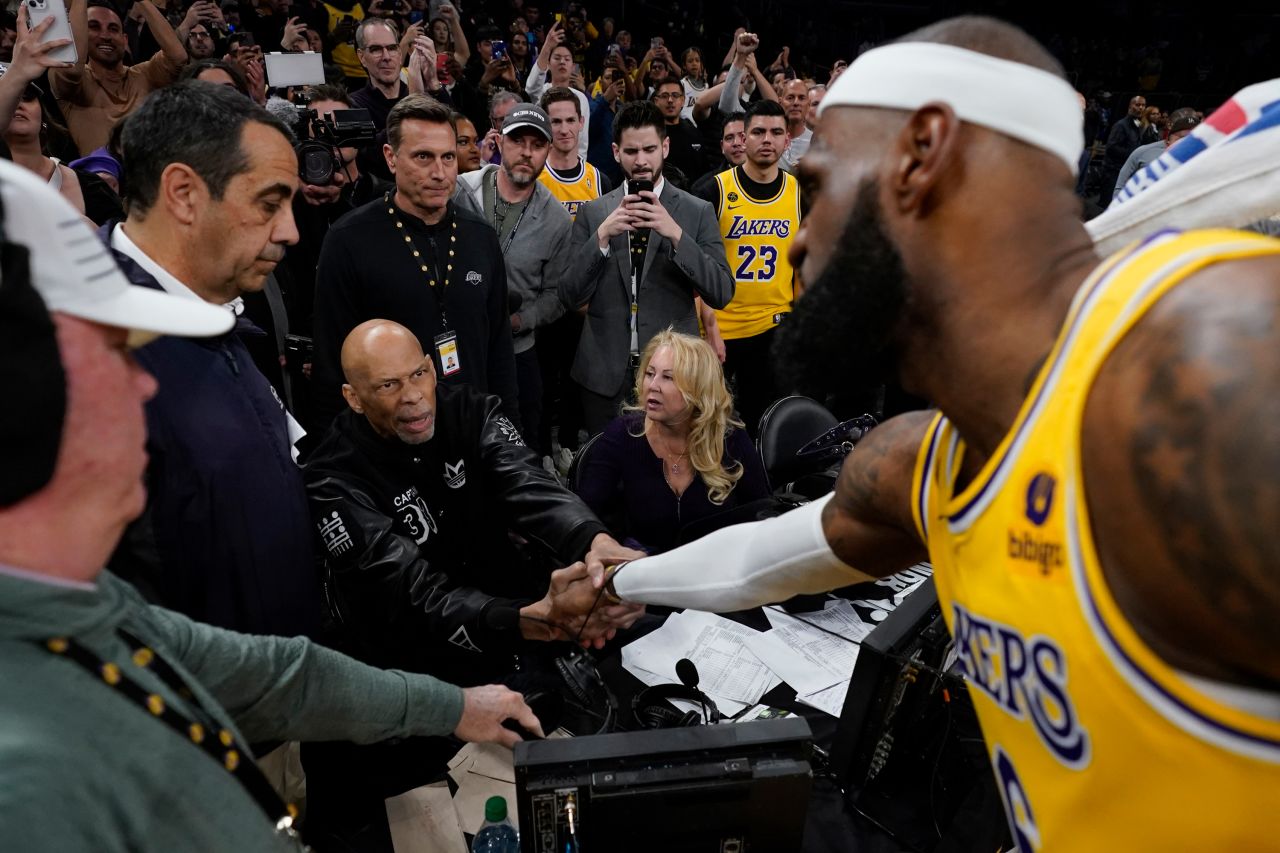 LeBron James, right, shakes hands with Kareem Abdul-Jabbar after <a href="https://www.cnn.com/2023/02/07/sport/lebron-james-breaks-nba-scoring-record-spt-intl/index.html" target="_blank">breaking the NBA's all-time scoring record</a> on Tuesday, February 7.
