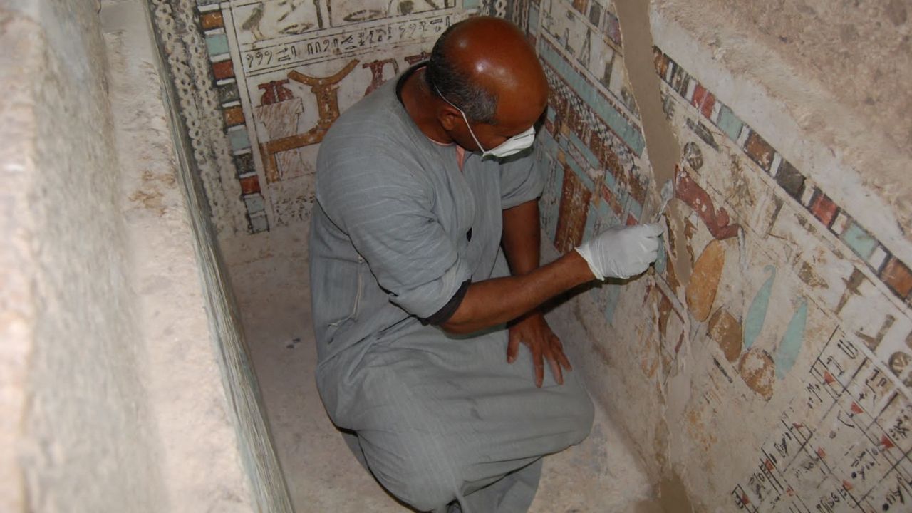 An Egyptian employee works at the 4,000-year-old tomb of Meru.