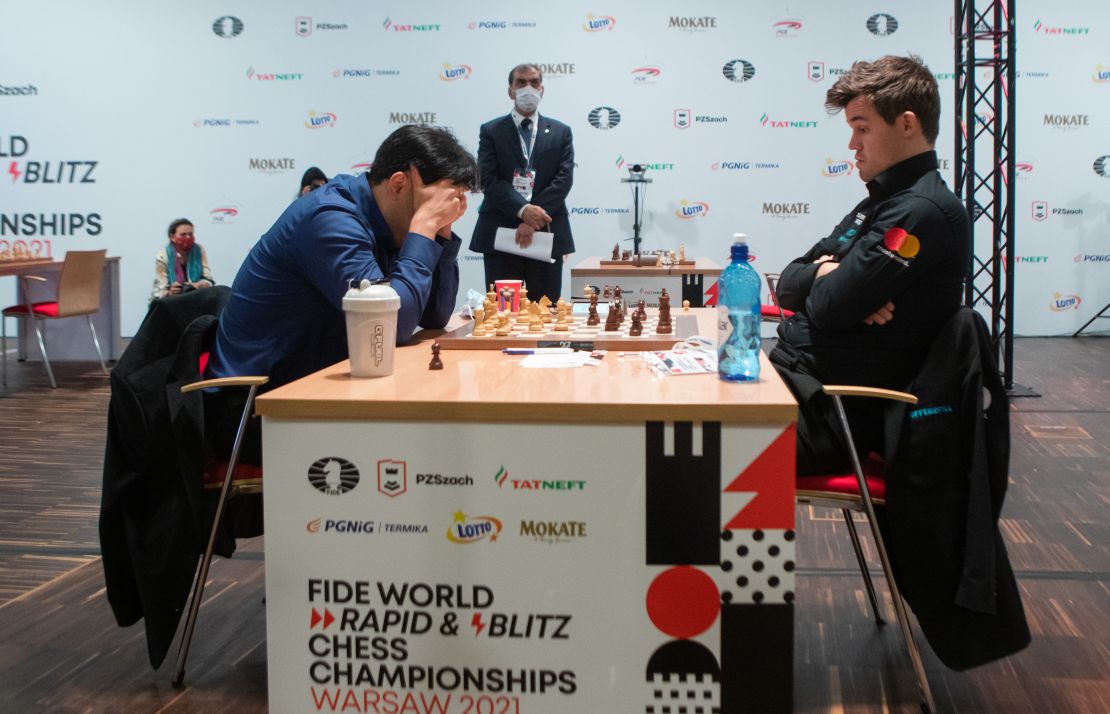 Nakamura (left) and Carlsen (right) during the FIDE Chess World Rapid and Blitz Championship in Warsaw, Poland in 2021.