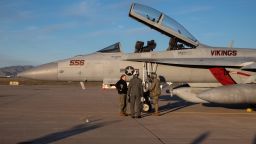 Caitlin Hillygus (left) and Nathaneal Airiyie (right, both Navy Maintainers on the Super Bowl Flyover team) instruct Tareq Salameh before his incentive flight in front of an EA-18G Growler on Feb. 8, 2023, at Luke Air Force Base in Glendale.

Super Bowl Flyover Crew 69872512007
