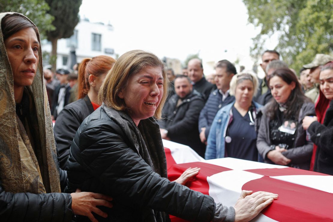 Mourners attend the funeral in Famagusta, in the breakaway Turkish Cypriot statelet of northern Cyprus, for seven Cypriot students killed in the earthquake in Turkey.