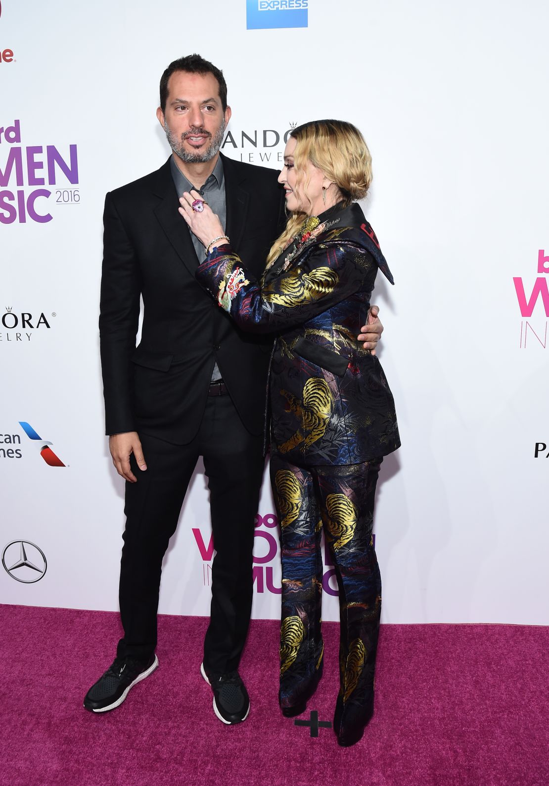Guy Oseary and Madonna at a 2016 Billboard Women In Music event. Oseary said both bought NFTs from Bored Ape Yacht Club.