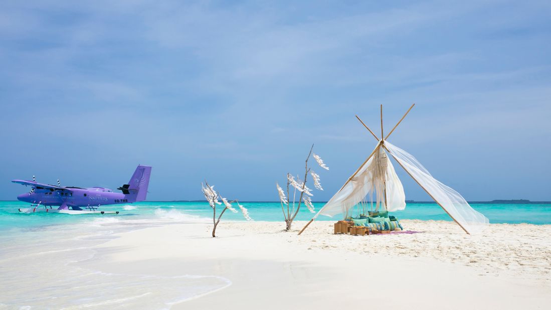 <strong>The Nautilus, Maldives:</strong> From the capital, Male, the resort's distinct purple seaplane takes guests on a scenic, 30-minute flight over islands and sandbars.  