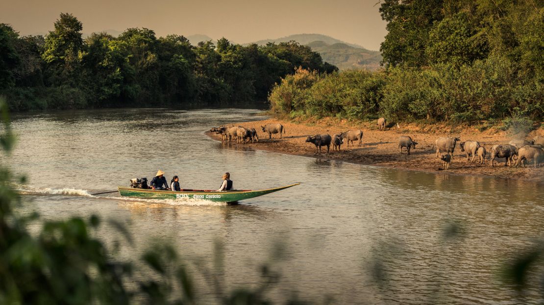 Four Seasons guests can arrive by road. But a trip up the Mekong on a tradtiional Thai boat is far more fun.