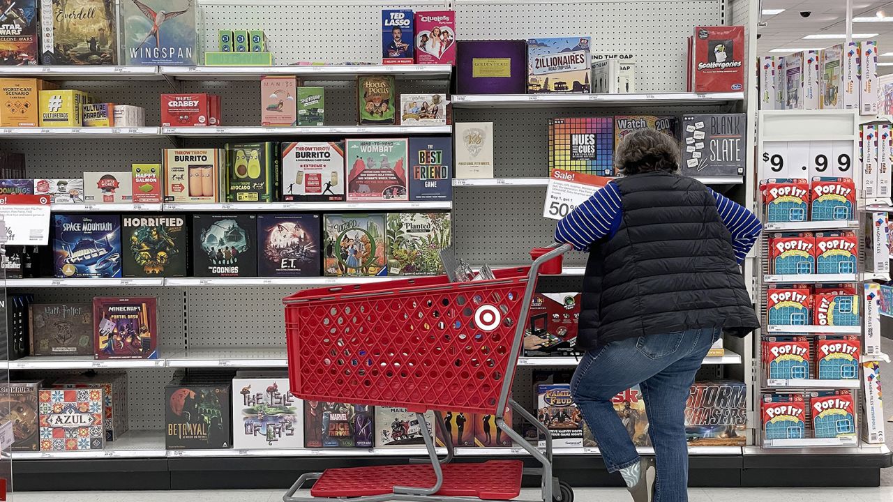A Target customer looks at a display of board games while shopping at Target store on December 15, 2022, in San Francisco, California.