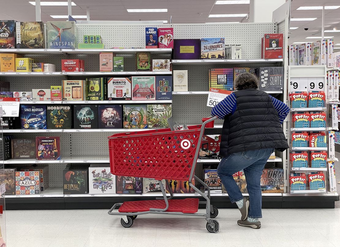 A Target customer looks at a display of board games while shopping at Target store on December 15, 2022, in San Francisco, California. 