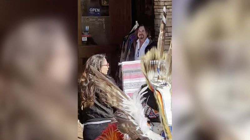 NextImg:Arizona police submit charges against art gallery owner seen on video insulting Indigenous performers | CNN