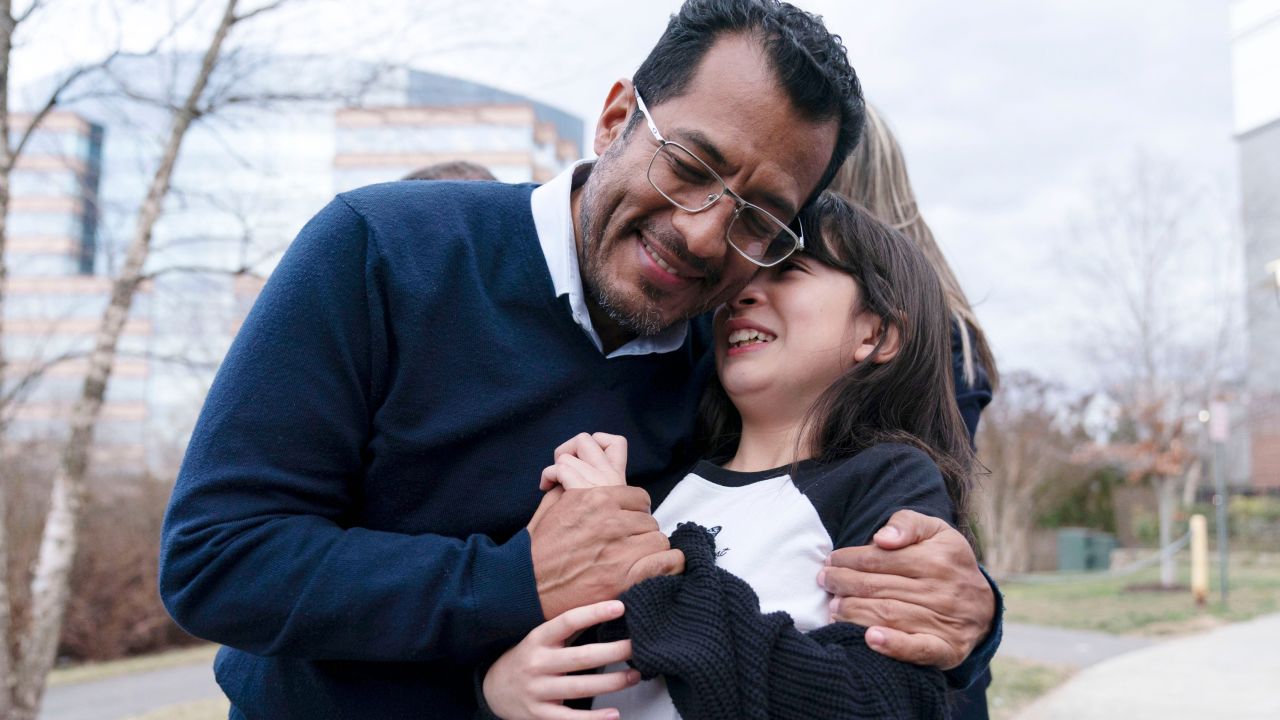 Felix Maradiaga hugs his daughter Alejandra, after arriving from Nicaragua at Washington Dulles International Airport, in Chantilly, on February 9. 