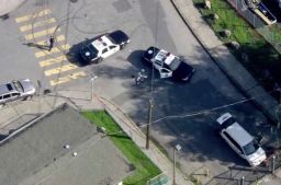 In this Dec. 1, 2017 file image taken from video provided by KTVU-TV, San Francisco police investigate an officer-involved shooting in the city's Bayview neighborhood in San Francisco. A rookie San Francisco police officer who was on his fourth day on the job when he fatally shot an unarmed carjacking suspect in the city's Bayview neighborhood has been fired. Police Chief Bill Scott fired officer Chris Samayoa three months after he fatally shot 42-year-old Keita O'Neil, the San Francisco Chronicle reported Tuesday, March 13, 2018. 