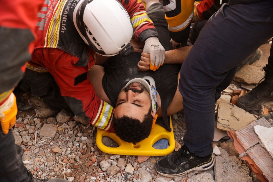 A man lies on a stretcher after he was rescued in Kahramanmaras on February 10.