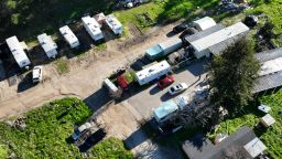 HALF MOON BAY, CALIFORNIA - JANUARY 25: The structure where mass shooting suspect Chunli Zhao, 66, allegedly lived with his wife, right center, with blue roof, is seen from this drone view at the California Terra Gardens mushroom farm in Half Moon Bay, Calif., on Wednesday, Jan. 25, 2023. Zhao was booked on seven counts of murder after the Jan. 23 mass shooting. (Jane Tyska/Digital First Media/East Bay Times via Getty Images)