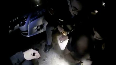 In this screengrab from a bodycam video released by the Raleigh Police Department, officers hold Darryl Tyree Williams to the ground.