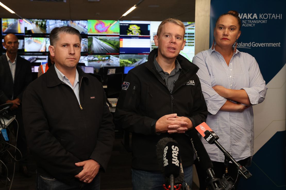 New Zealand Prime Minister Chris Hipkins (C), Deputy Prime Minister Carmel Sepuloni (R), and Transport Minister Michael Wood (L) at Waka Kotahi Auckland Transport operations room ahead of Cyclone Gabrielle's arrival on February 12 in Auckland.