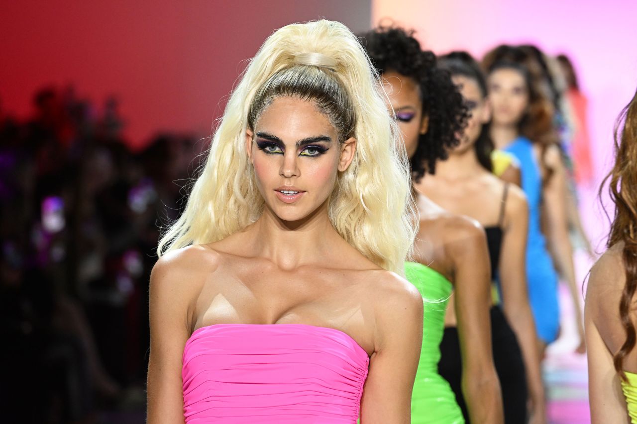 Sergio Hudson's highlighter-colored hues and slick retro suiting took notes from Fran Drescher in "The Nanny," Hilary Banks in "The Fresh Prince of Bel-Air" and Barbie.