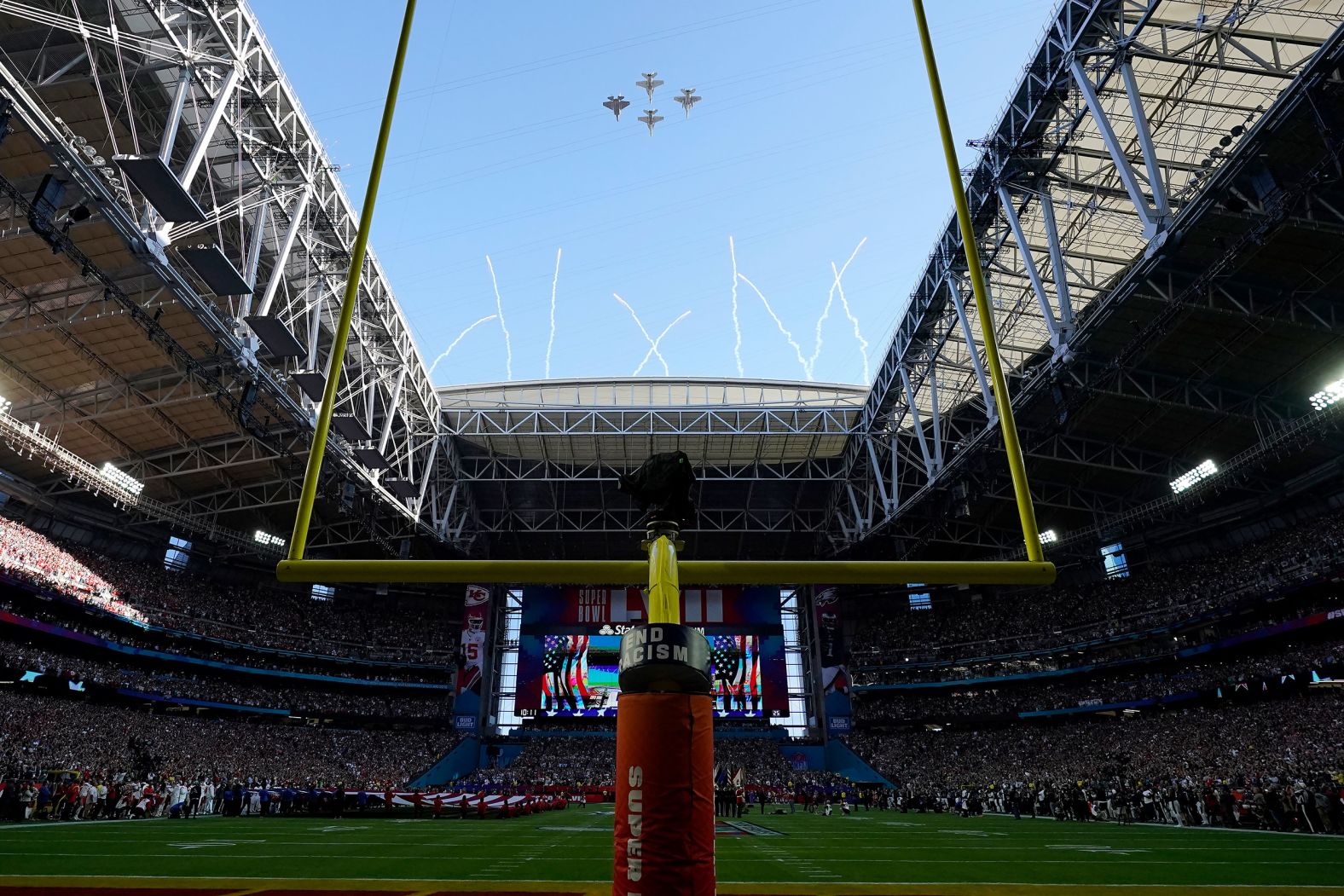 US Navy jets fly over State Farm Stadium before the start of the game. For the first time ever, the ceremonial act <a href="https://www.cnn.com/2023/02/10/sport/all-women-flyover-super-bowl-lvii-spt-intl/index.html" target="_blank">was performed by an all-women crew</a>.
