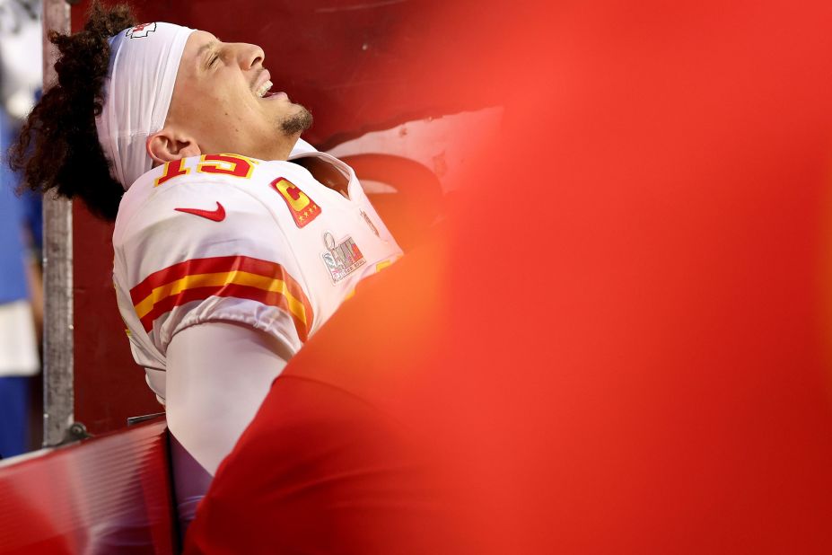Mahomes reacts on the bench after he appeared to aggravate an ankle injury near the end of the first half. He came back, however, for the start of the second half.
