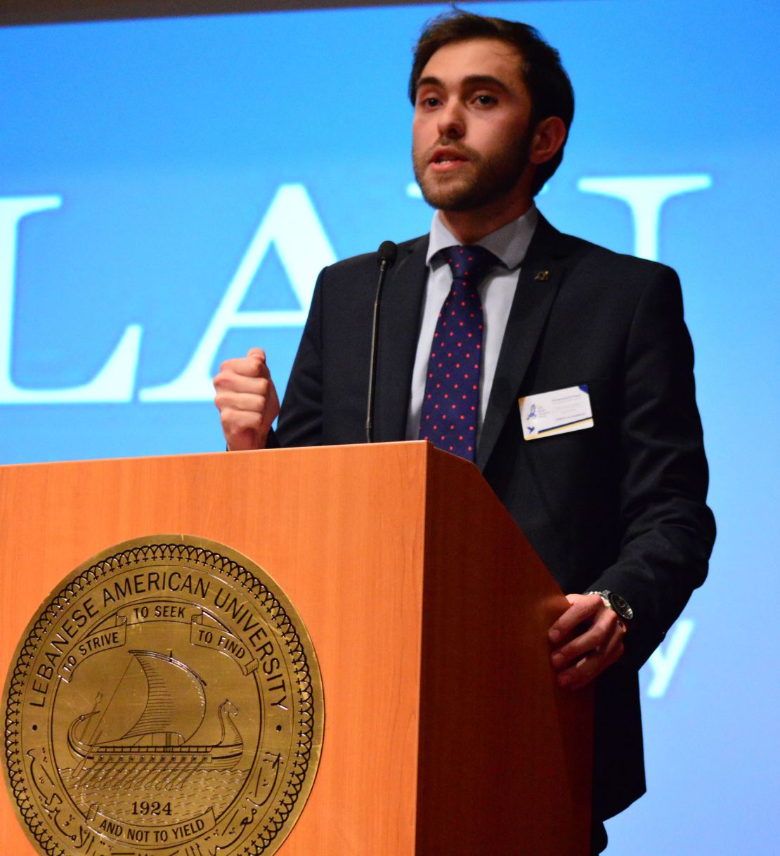 Ameer Alsamman speaking at Lebanese American University.