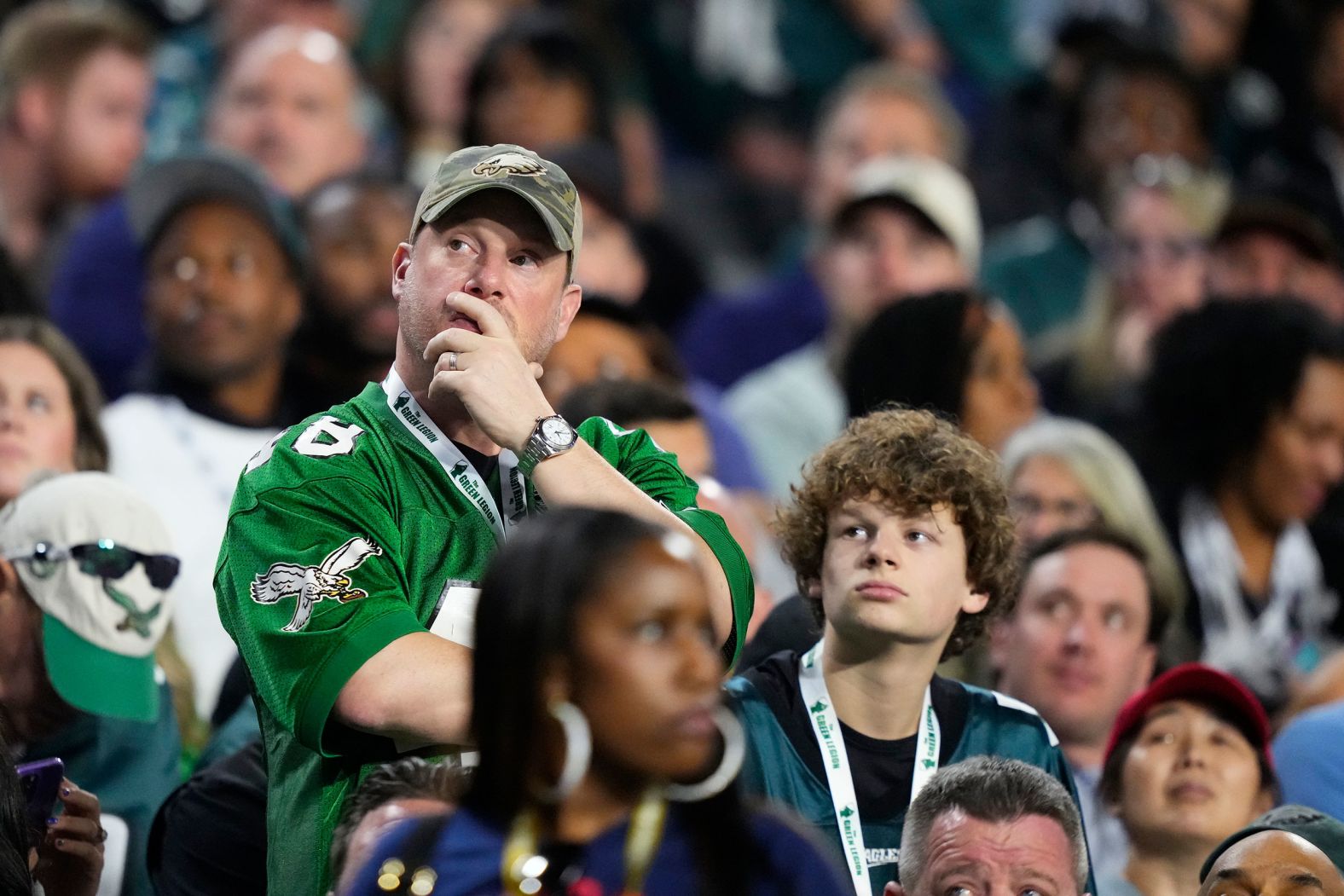 An Eagles fan watches the game in the second half.