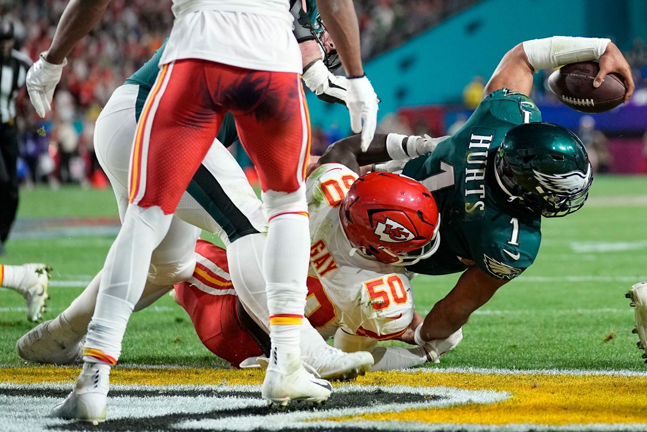 Eagles quarterback Jalen Hurts scores a two-point conversion to tie the Super Bowl at 35-35 in the fourth quarter. Hurts finished the game with three rushing touchdowns and one passing touchdown.