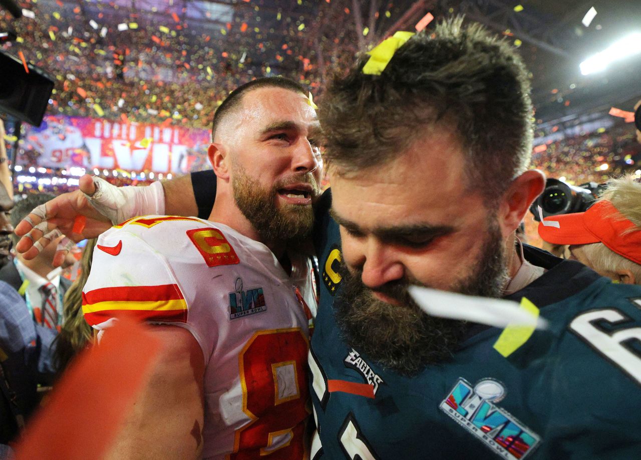 Chiefs tight end Travis Kelce embraces his brother, Eagles center Jason Kelce, during the postgame celebrations. This was the first Super Bowl in history where two brothers played on opposite teams.