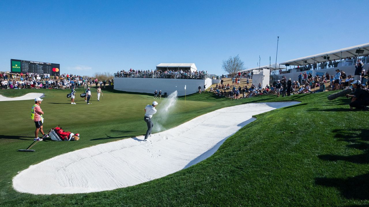 McIlroy plays out of a bunker during the final round.