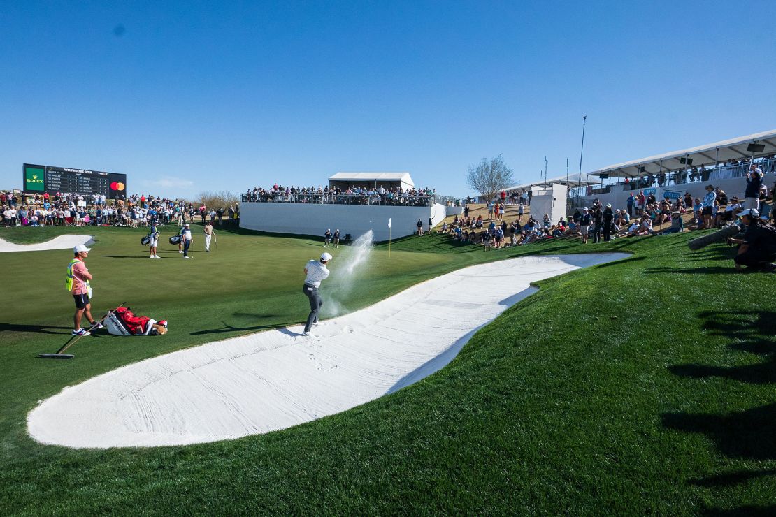 McIlroy plays out of a bunker during the final round.