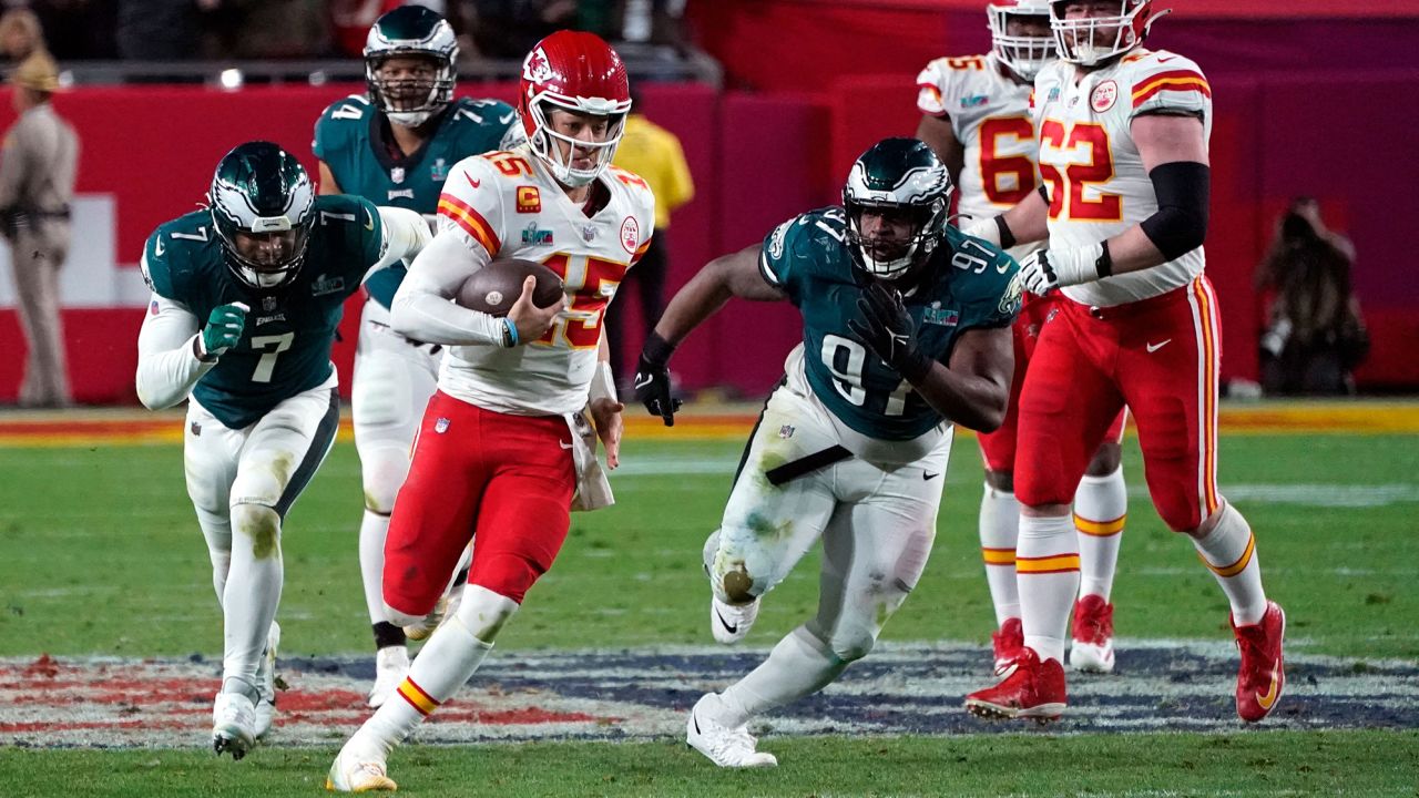 Kansas City Chiefs' quarterback Patrick Mahomes runs with the ball during Super Bowl LVII against the Philadelphia Eagles.