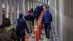 EL PASO, TEXAS - JANUARY 09: High school students walk across an international bridge while commuting from Ciudad Juarez in Mexico on January 09, 2023 to El Paso, Texas. Thousands of students, most carrying American passports, cross the border from Mexico each day to attend school in U.S. border cities and towns. President Joe Biden visited El Paso on January 8, his first visit to the border since he became president two years before. U.S. Border authorities took into custody more than 2.5 million migrants in 2022, the highest number on record. (Photo by John Moore/Getty Images)