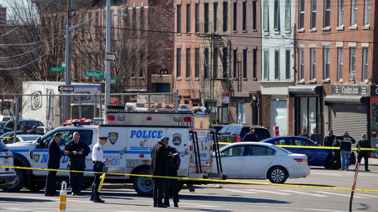Police gather in New York on Monday where a rental truck was stopped and the driver arrested.