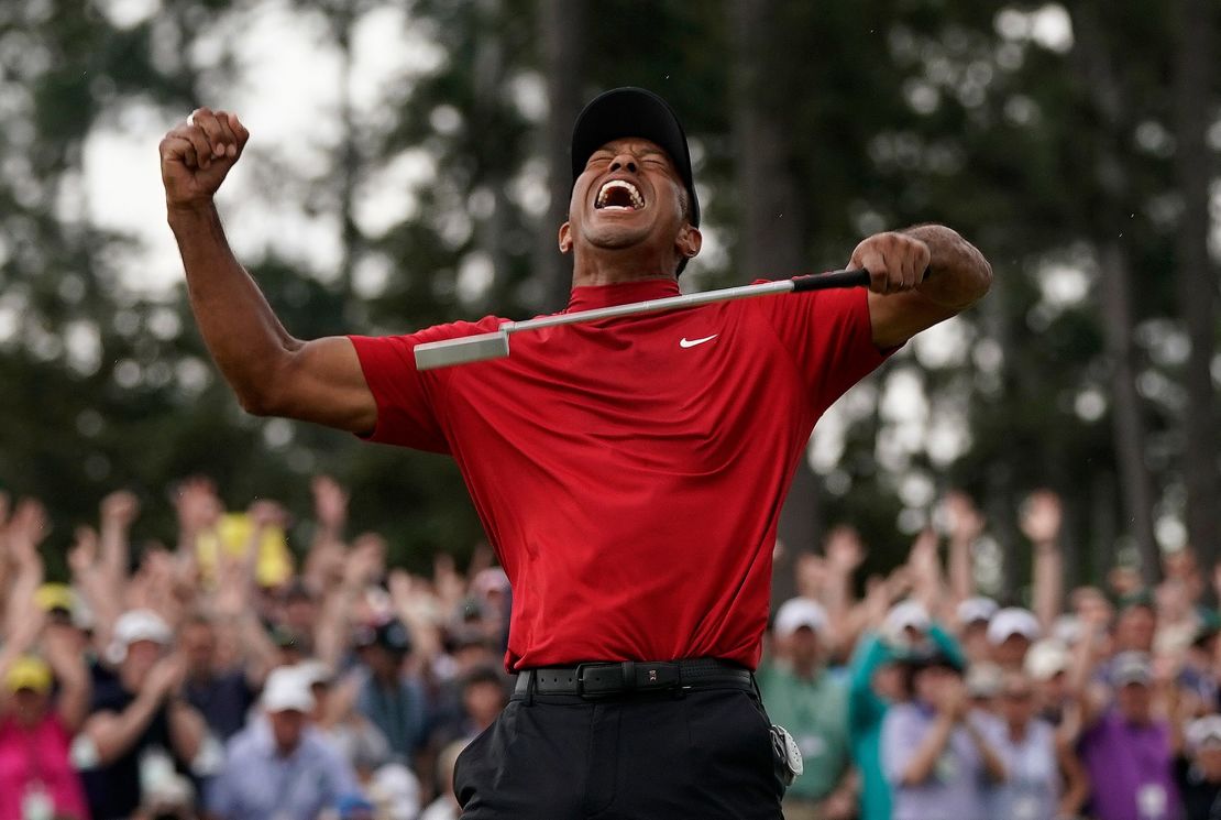 FILE - Tiger Woods reacts as he wins the Masters golf tournament Sunday, April 14, 2019, in Augusta, Ga. In a survey, this rated as his second-most significant win of his five Masters titles. (AP Photo/David J. Phillip, File)