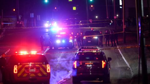 Police work the scene where a man suspected of a shooting on the Michigan State University campus February 14, 2023, in Lansing.