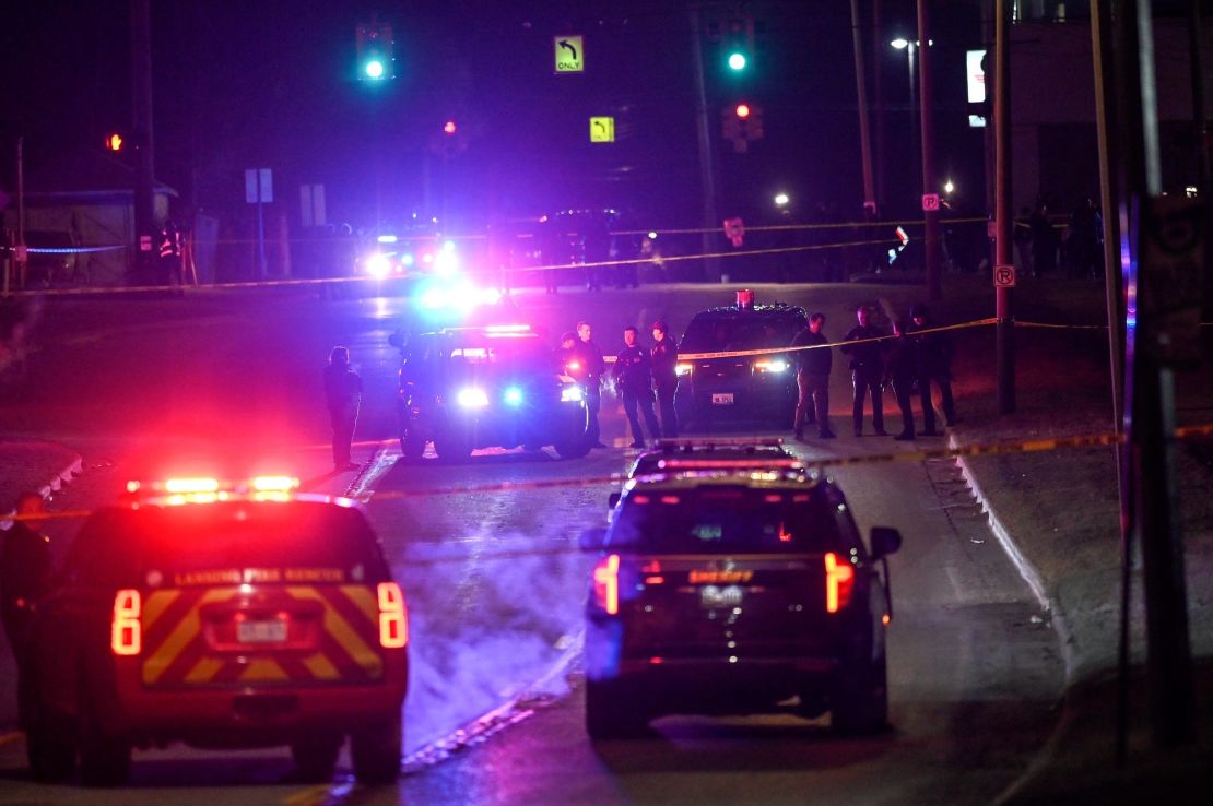 Police work the scene Tuesday after a shooting on the Michigan State University campus.