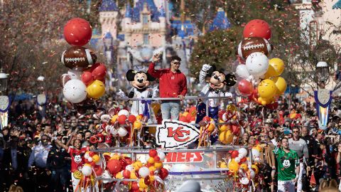 Mahomes celebrates his team's Super Bowl LVII triumph with a victory parade down Main Street alongside Mickey Mouse and Minnie Mouse at Disneyland Park.