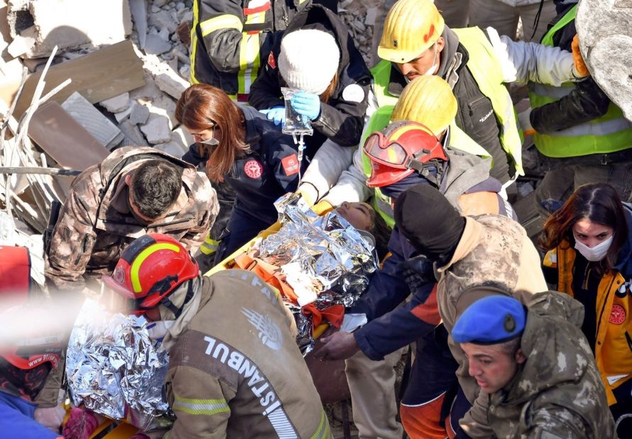 A woman is rescued from rubble in Hatay, Turkey on February 14. Rescue teams in southern Turkey <a href="https://www.cnn.com/2023/02/14/europe/turkey-earthquake-voices-heard-under-rubble-intl-hnk/index.html" target="_blank">said they were still hearing voices from under the rubble</a> more than a week after the earthquake.