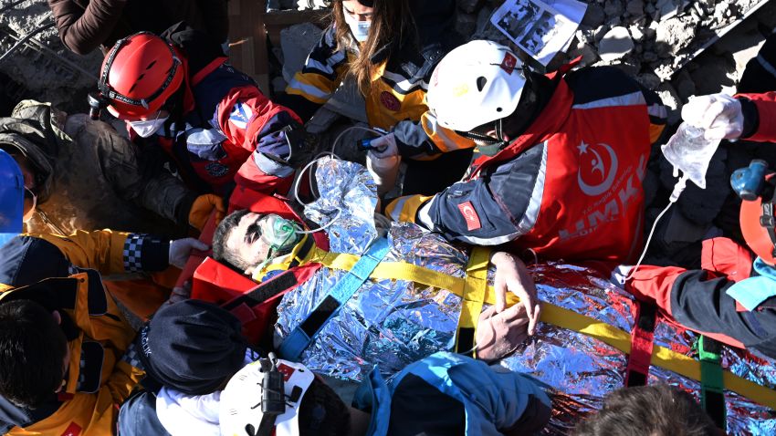 ADIYAMAN, TURKIYE - FEBRUARY 14: 18-year-old teenager, Muhammed Cafer Cetin is rescued by search and rescue teams from under rubble of a collapsed building 198 hours after 7.7 and 7.6 magnitude earthquakes hit Turkiye's Adiyaman, on February 14, 2023. On Feb. 06, a strong 7.7 earthquake, centered in the Pazarcik district, jolted Kahramanmaras and strongly shook several provinces, including Gaziantep, Sanliurfa, Diyarbakir, Adana, Adiyaman, Malatya, Osmaniye, Hatay, and Kilis. Later, at 13.24 p.m. (1024GMT), a 7.6 magnitude quake centered in Kahramanmaras' Elbistan district struck the region. (Photo by Aytac Unal/Anadolu Agency via Getty Images)