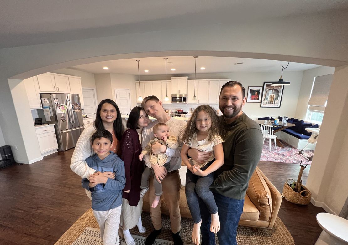 Aaron Reyes and his family pose with the Manzurins in Austin, Texas, on Nailia's birthday. 