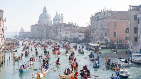 Boats fill the Grand Canal in Venice during a past Carnival, which has surged in popularity since returning in the modern era in 1979.