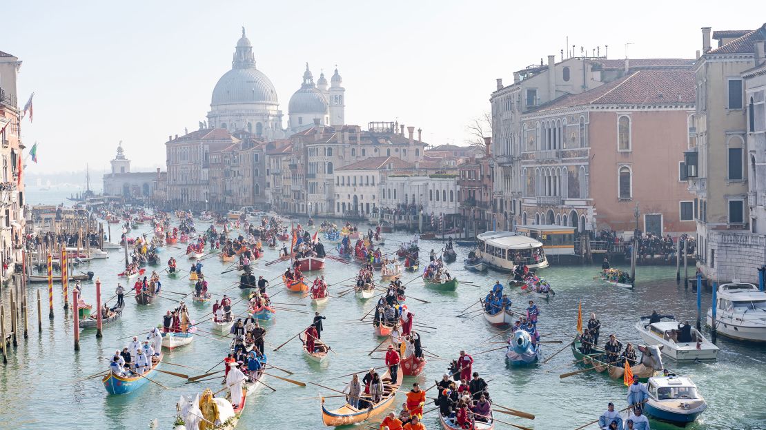 Boats fill the Grand Canal in Venice during a past Carnival, which has surged in popularity since returning in the modern era in 1979.