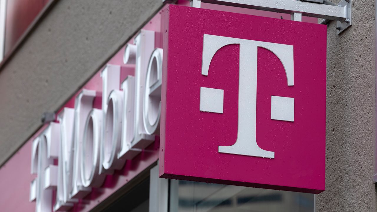 The T-Mobile logo is seen on a storefront, on Oct. 14, 2022, in Boston.