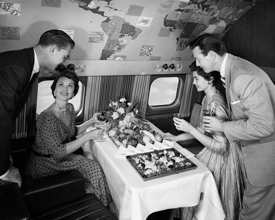 <strong>TWA's 'Super G' Constellation in 1965:</strong> Fine dining is all very well, but it's not so great when you hit turbulence and the sick bags come out. <br />
