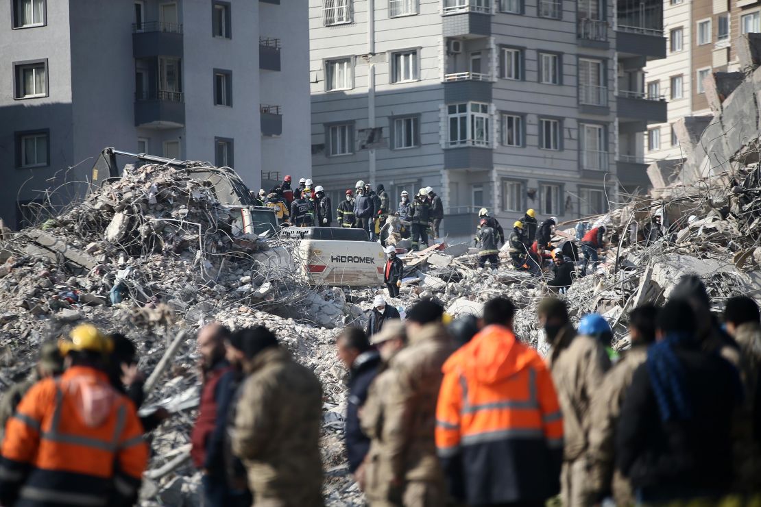 Personnel conduct search and rescue operations in the debris of the building where Atsu lives in Hatay, Turkey, on February 12.