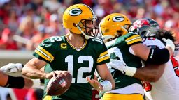 Aaron Rodgers #12 of the Green Bay Packers looks to throw a pass against the Tampa Bay Buccaneers in Tampa, Florida.
