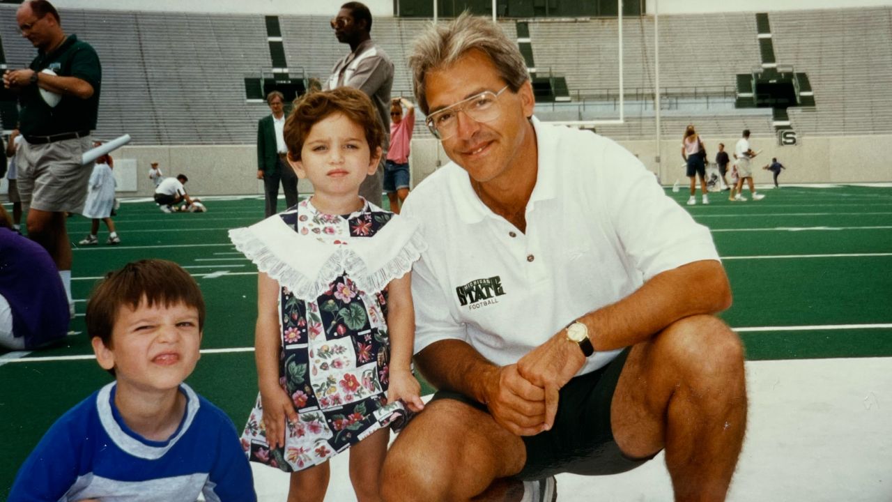 Goldynia and her brother spent time on the field with then-Spartan football coach Nick Saban in 1996.